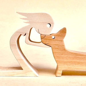a woman a corgi; original wood sculpture 2virgule5d