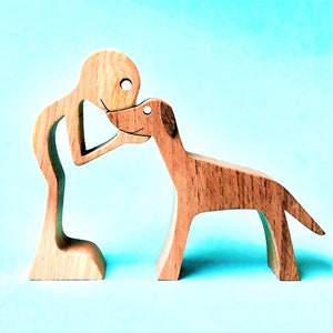 a man a greyhound new version; Wood sculpture Chantournage