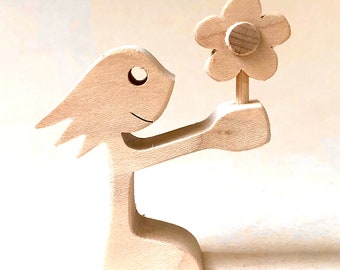 a girl offers a flower (maple version); original wood sculpture 2comma5d