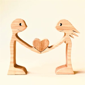 Una coppia, un cuore; scultura originale in legno 2,5d