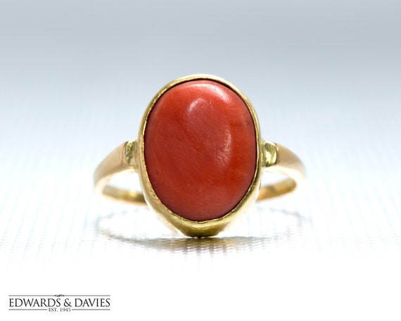 Natural & Lab Certified stone triangular Moonga /Coral Stone Punchdhatu Ring (Gold Plated) at Rs 11999/piece in Delhi