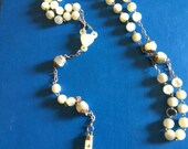 Vintage French rosary, mother of pearl cross and beads.