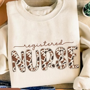 Registered Nurse Sweatshirt with Western Cow Print,  RN Tee,New Nurse Grad Gift, Nursing Student Sweater, Nurse appreciation bestfriend gift
