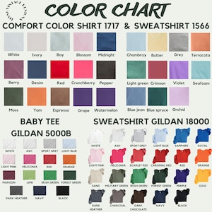 May include: A color chart for Comfort Color Shirt 1717, Sweatshirt 1566, Baby Tee Gildan 5000B, and Sweatshirt Gildan 18000. The chart displays various fabric swatches labeled with color names including white, ivory, red, blue, green, and black.