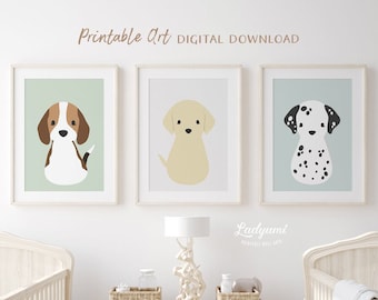 May include: Three printable art prints featuring illustrations of dogs. The prints are in white frames and have a light green background. The dogs are a beagle, a labrador retriever, and a dalmatian.