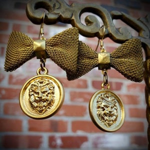 Sweet & Salty - Gold plated mesh bow and Lion Coin charm earrings