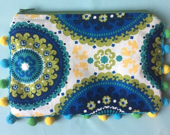 Medallion pom-pom purse