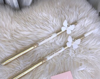 Juego de 2 velas cónicas doradas con mariposas para bautizo