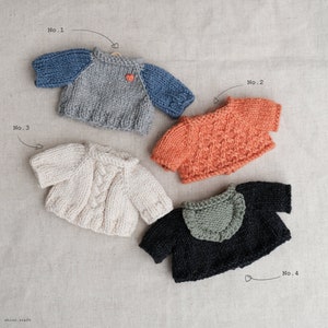 knitting pattern: Sweaters for toys.