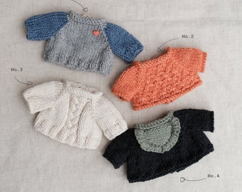 knitting pattern: Sweaters for toys.