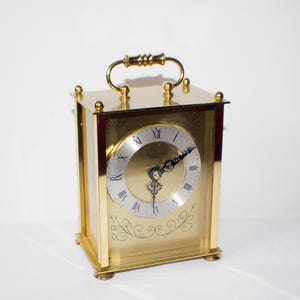 Vintage Anstey & Wilson Golden Brass Mantel Clock with Floating Pendulum