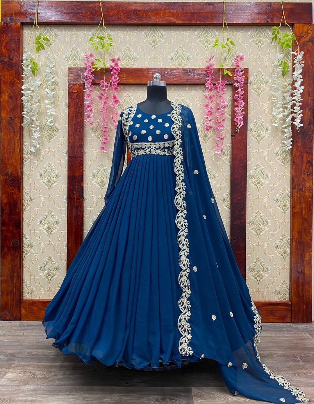 Party wear gown in blue colour top