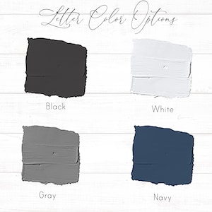 May include: Four paint swatches showing different color options for lettering: black, white, gray, and navy.