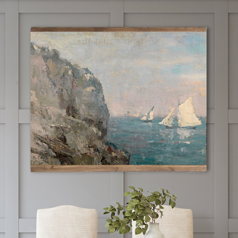 May include: A painting depicting a rocky cliff overlooking a tranquil sea with several sailboats in the distance. The sky is a soft blue and the water is a light blue-green. The painting is executed in a realistic style.