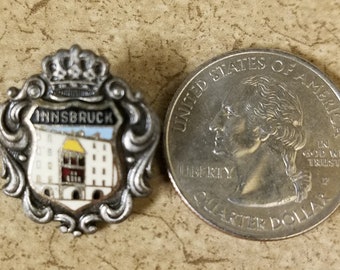 Vintage enamel/pewter (?) ski pin/badge from Innsbruck Austria