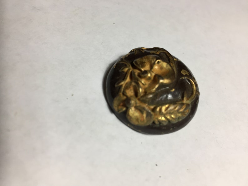 Vintage Metal Button with Raised FlowerLeaf Motif Good Condition Size 1 Black and Gold Paint Self Shank Fast Shipping