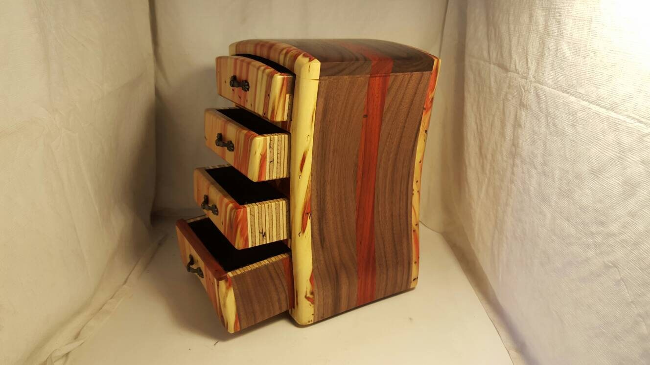 Bandsaw box made from red flame box elder, padauk, and walnut