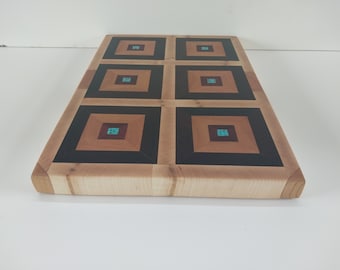 Endgrain cutting board made from rosewood, mahogany, cherry, maple, and acrylic