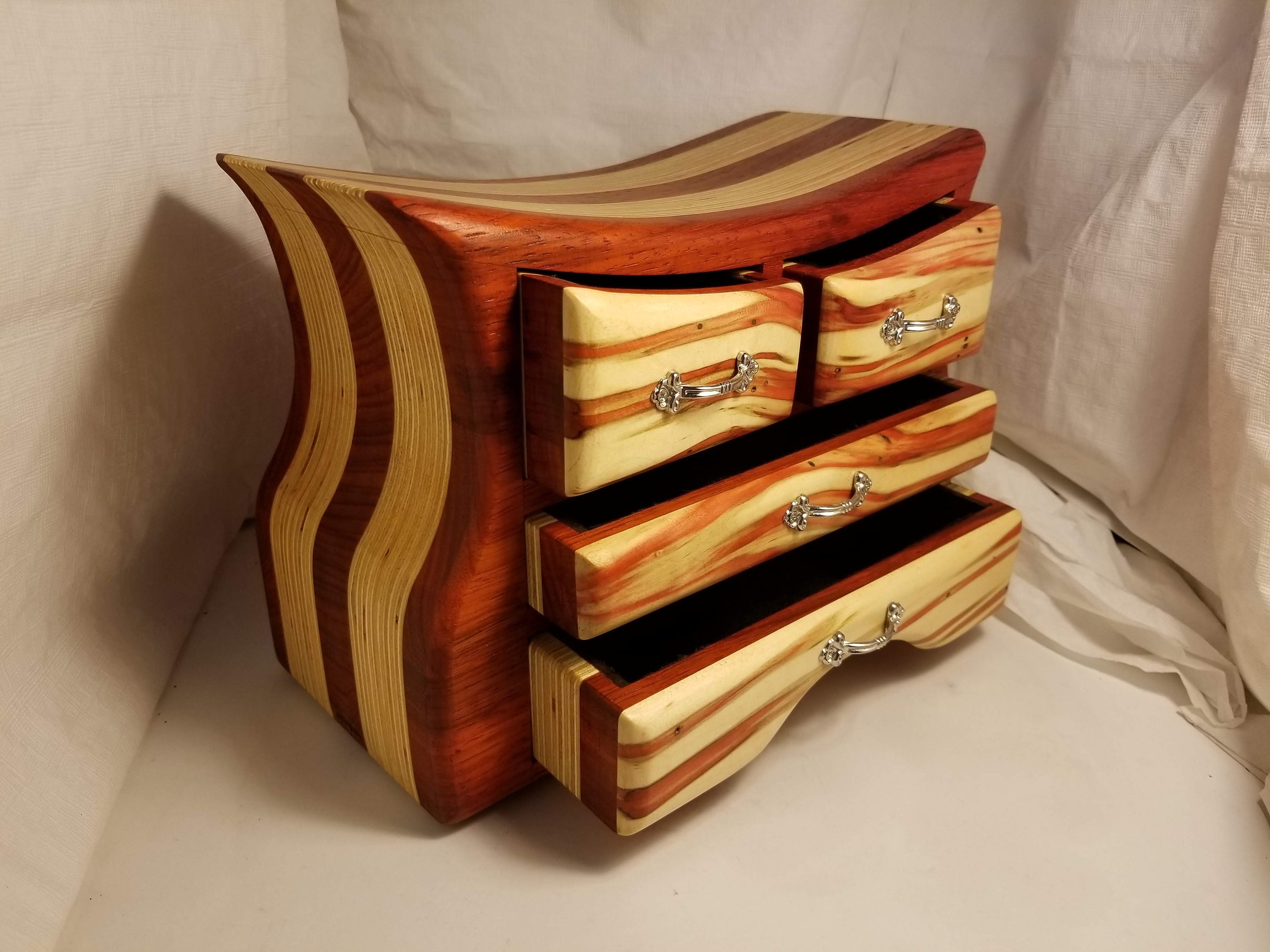 Bandsaw box made from padauk, red flame box elder, and plywood