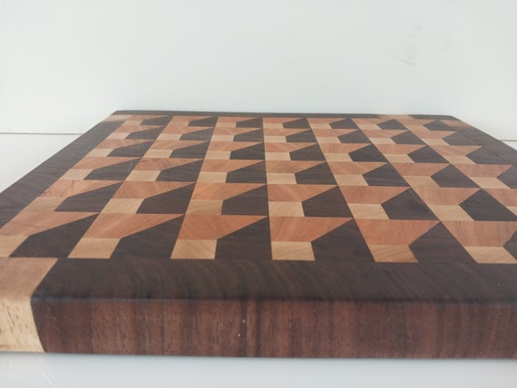 3 D end grain cutting board made from walnut, cherry, and maple