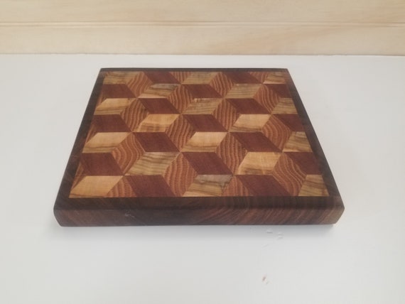 3d end grain cutting board made from mahogany,  poplar,  oak, and walnut