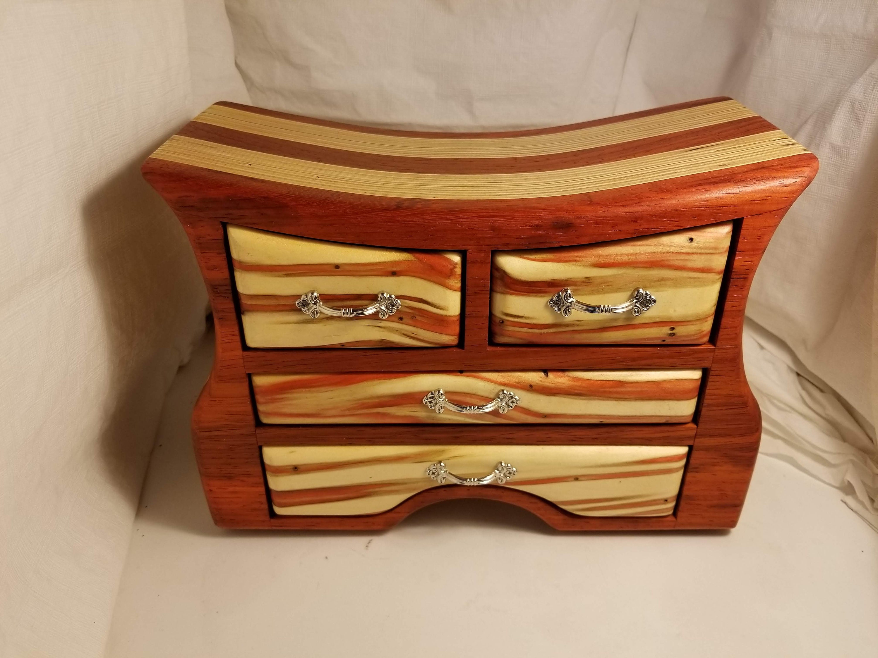 Bandsaw box made from padauk, red flame box elder, and plywood