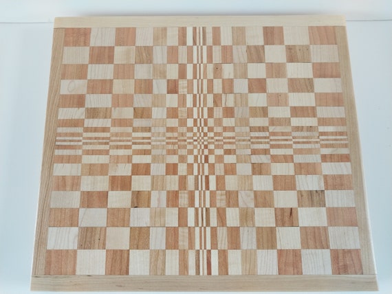 Optical illusion endgrain cutting board made from cherry and maple