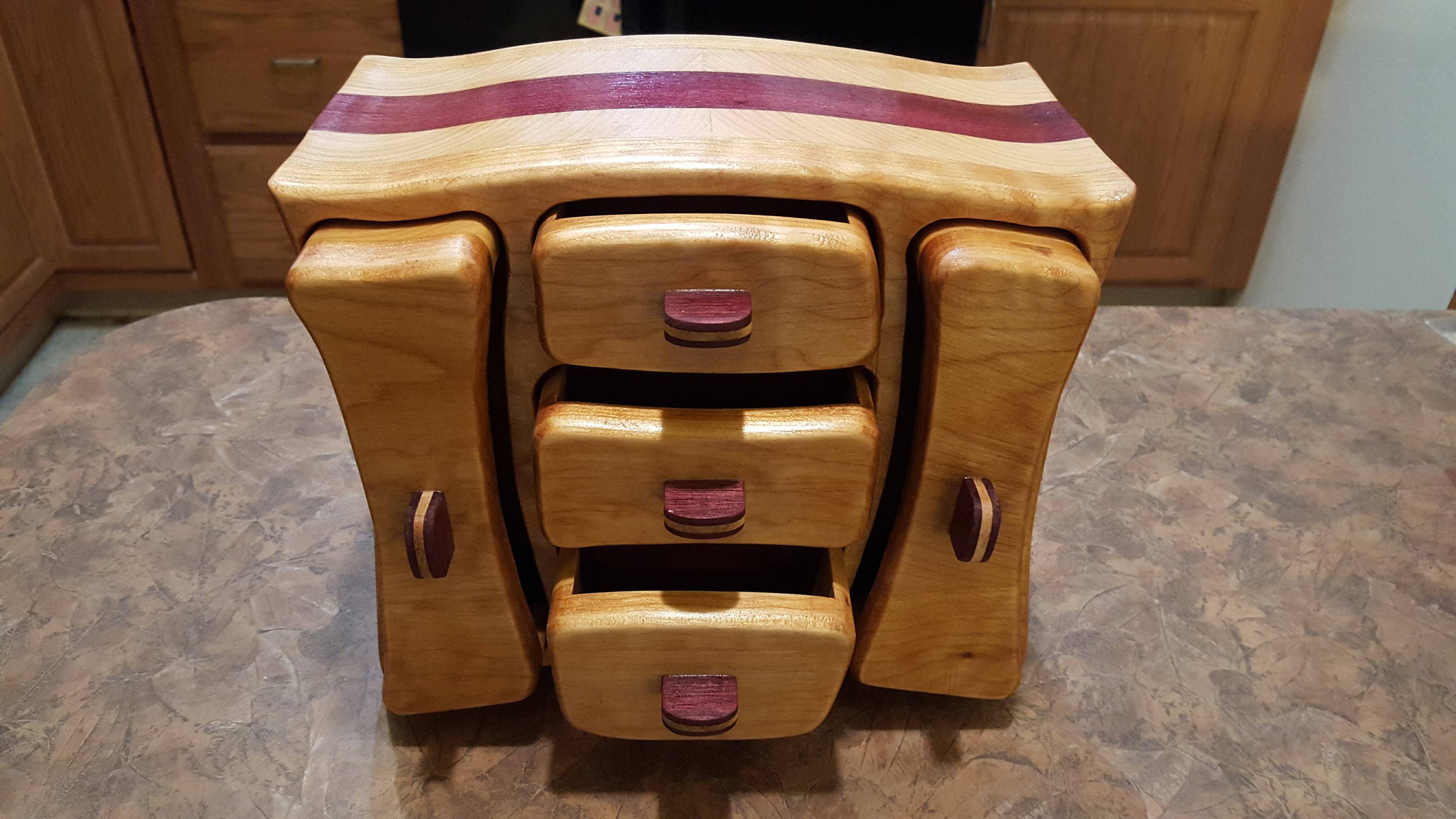 Bandsaw box made from western maple, purple heart, and pine