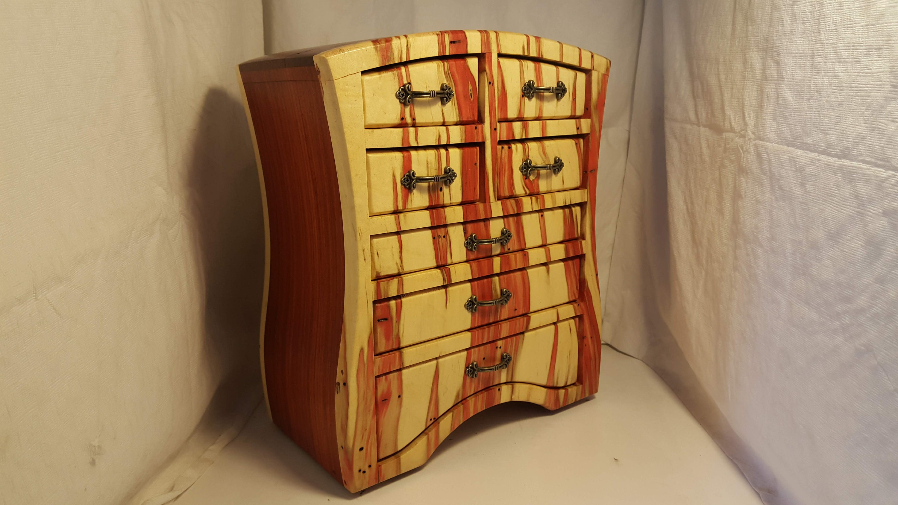 Bandsaw box made from red flame box elder, padauk,and plywood