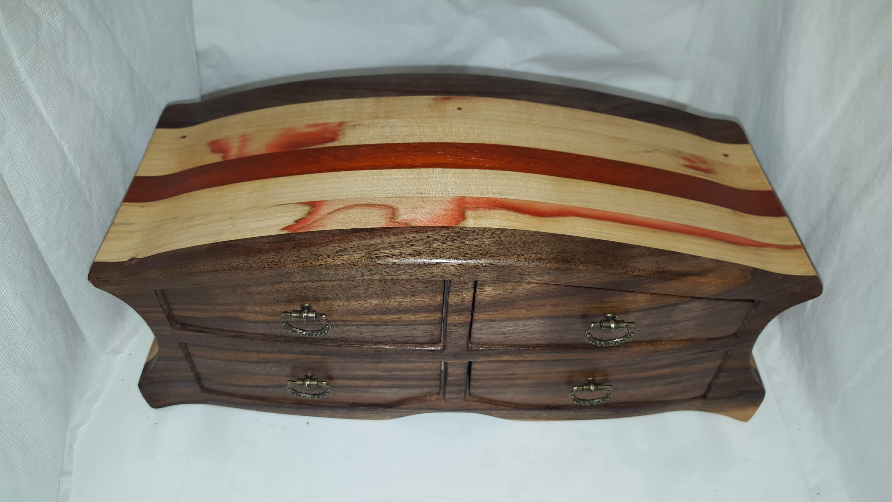 Bandsaw box made from claro walnut, red flame box elder, and padauk
