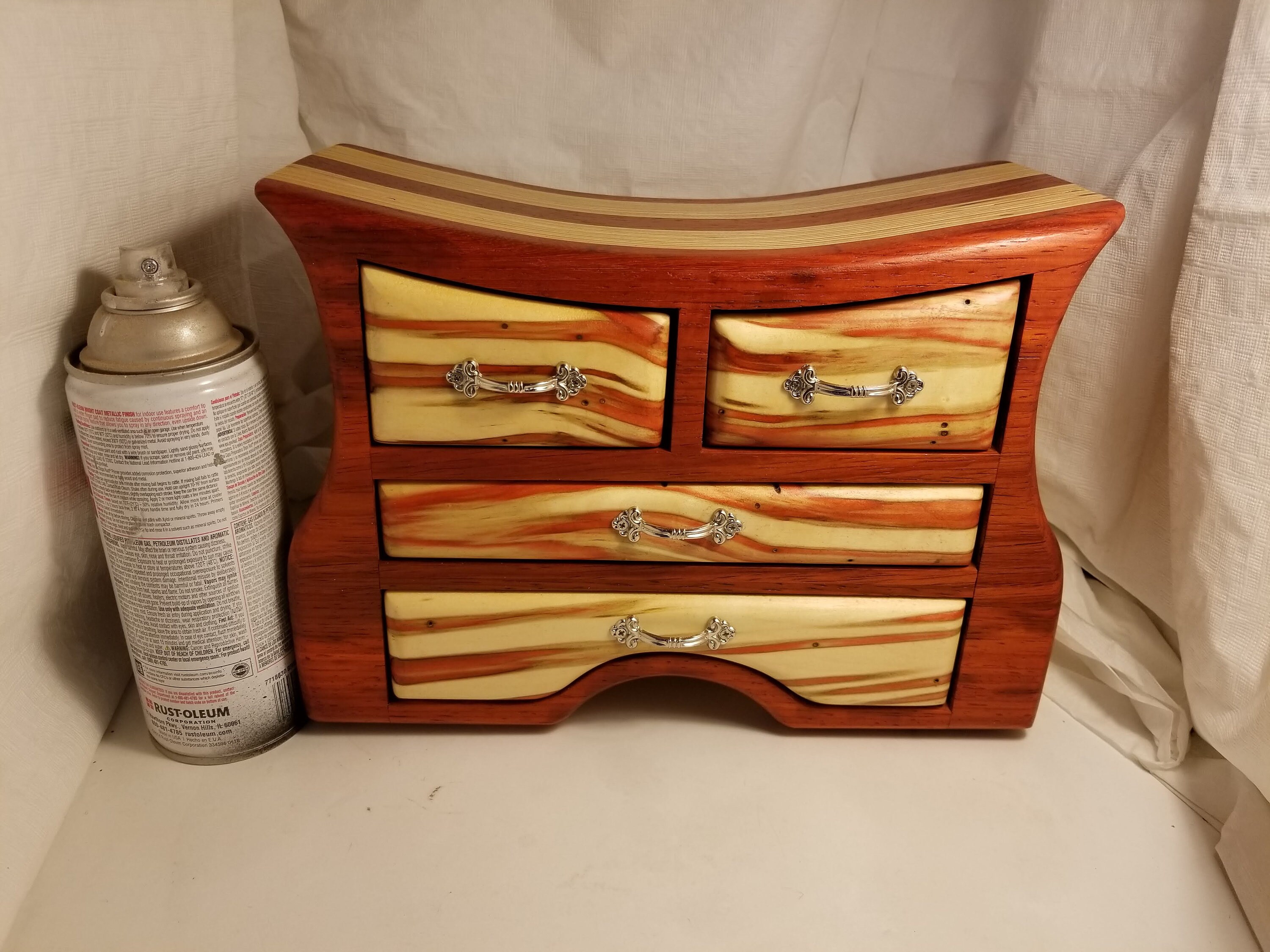 Bandsaw box made from padauk, red flame box elder, and plywood