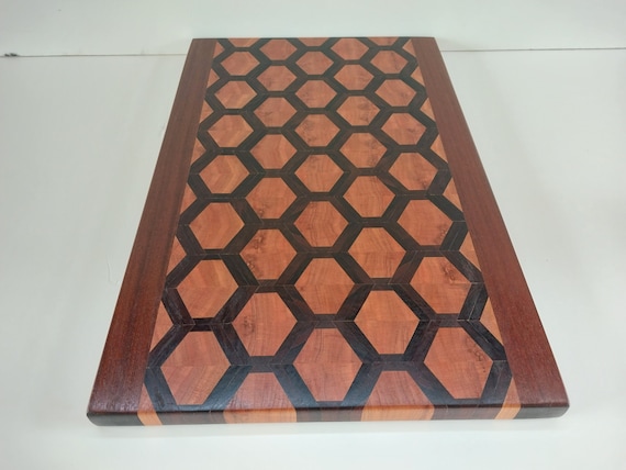 Honeycomb pattern end grain cutting board made from rosewood and cherry