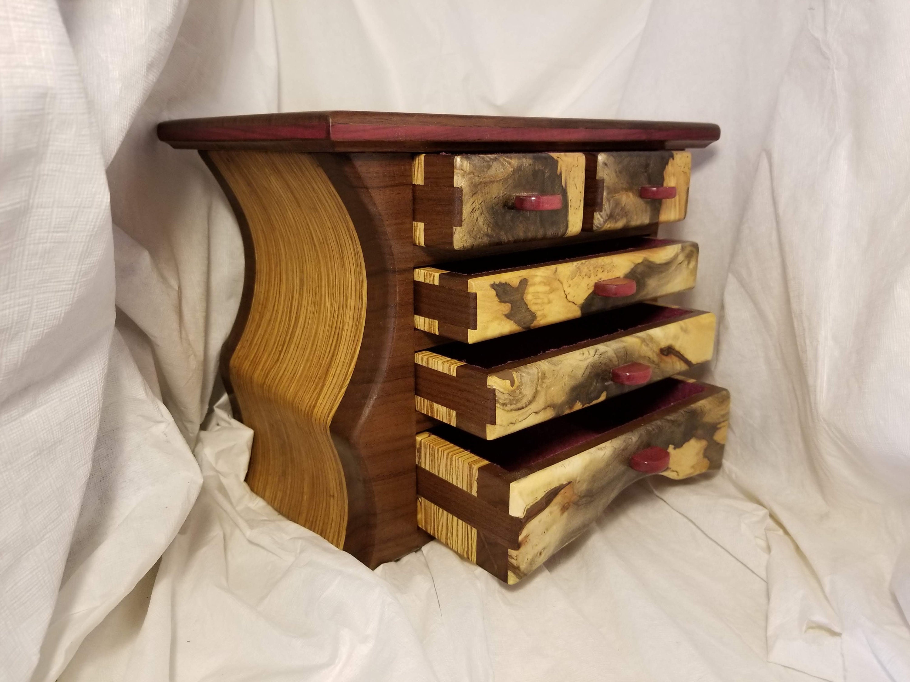 Jewelry/bandsaw box made from black walnut, buckeye burl, purple heart