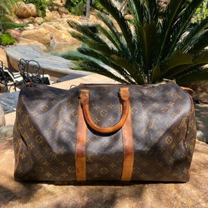 Louis Vuitton Keepall, The Luxury Duffle That Knows No Bounds, Handbags &  Accessories