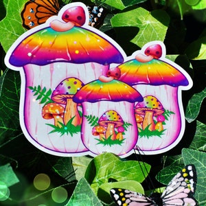 May include: Colorful mushroom stickers with rainbow tops and pink stems, featuring smaller mushroom illustrations inside. The stickers are surrounded by green leaves and butterflies with orange and pink wings.