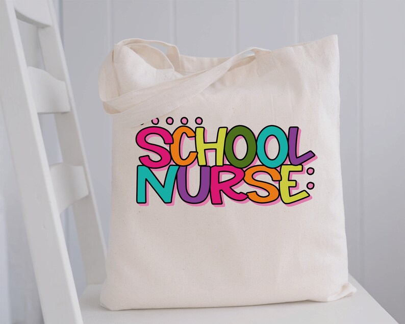 May include: A white canvas tote bag with the words "SCHOOL NURSE" printed in colorful, outlined letters. The letters are in different colors, including pink, orange, yellow, green, and purple.