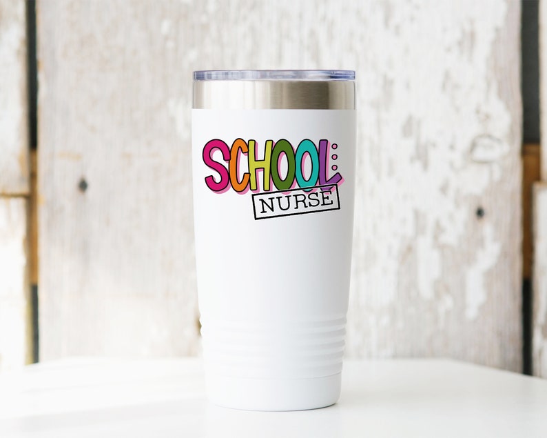 May include: White stainless steel tumbler with a colorful "SCHOOL NURSE" graphic.