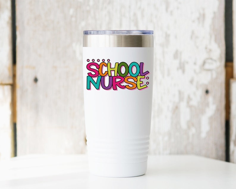 May include: White stainless steel tumbler with a colorful graphic that says "SCHOOL NURSE:"