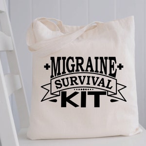 May include: White canvas tote bag with black text that reads "Migraine Survival Kit".