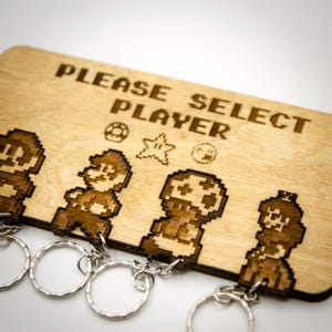 Llavero de madera para pared inspirado en Super Mario "Selecciona un jugador" / Soporte para llavero cortado a láser / Decoración para el hogar y regalo para gamers geeks
