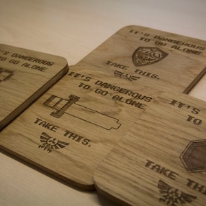 It&#39;s dangerous to go alone! Inspired Drinks Coasters - Set of Four