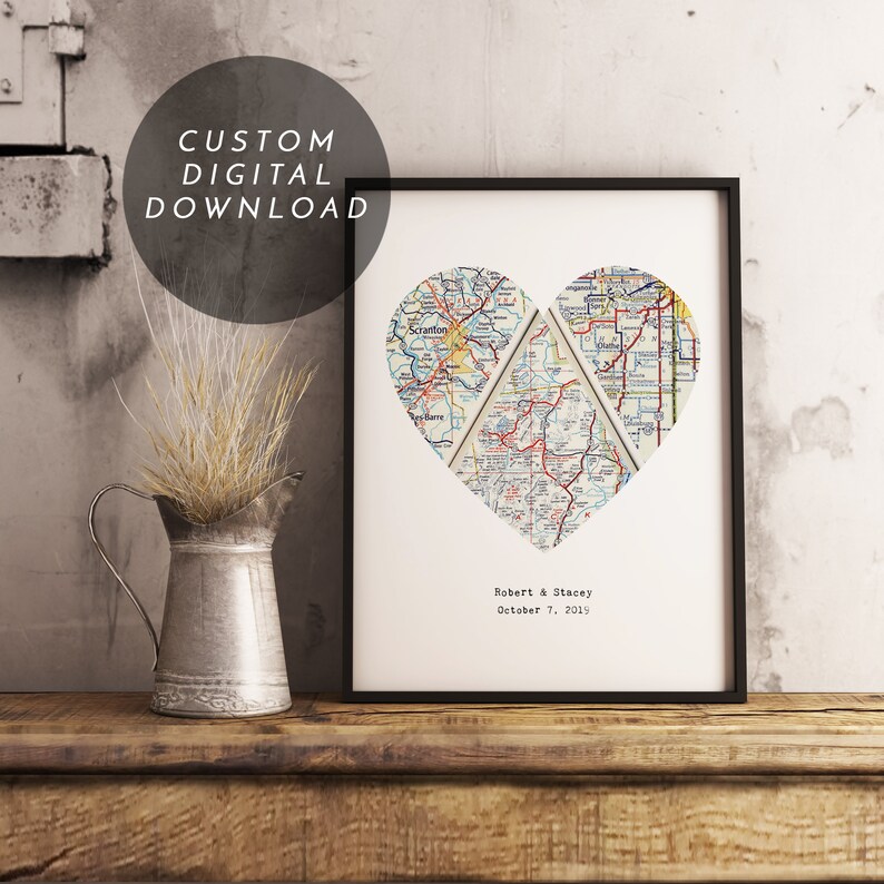 May include: A framed print featuring a heart-shaped design composed of vintage map segments. The print includes the text "Robert & Stacey" and "October 7, 2015". The words "CUSTOM DIGITAL DOWNLOAD" are in a circle in the upper left corner.