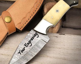 Engraved Damascus Hunting Knife: Buffalo Horn & Bone Handle, Leather Sheath