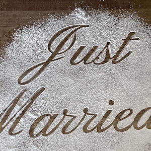 May include: A set of three ceramic mugs with a speckled, matte finish. The mugs are in shades of cream, light gray, and dark gray. Each mug has a simple, minimalist design, perfect for coffee or tea.