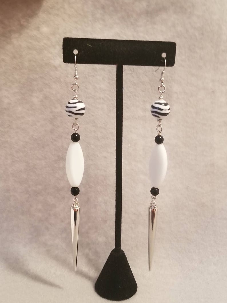 White and black spike earrings image 1