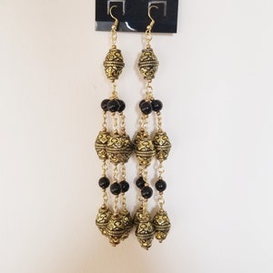Gold and black earrings