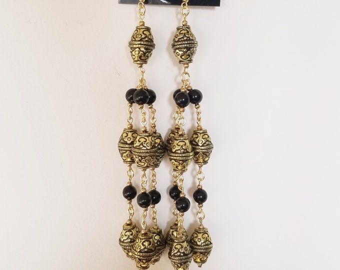 Gold and black earrings