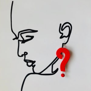 May include: Red question mark shaped earrings with a small red ball at the bottom.