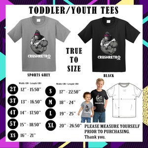 May include: Sports grey and black toddler/youth tees with a graphic of a gorilla wearing sunglasses and the text "CRUSHRETRO.COM". Size chart shows measurements in inches. The image includes the text "TRUE TO SIZE" and "PLEASE MEASURE YOURSELF PRIOR TO PURCHASING."