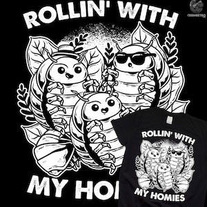 May include: Black and white graphic t-shirt design featuring three cartoon pill bugs with the text "Rollin' with my homies".